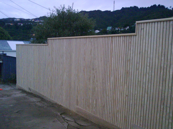 Painted vertical trellis fence